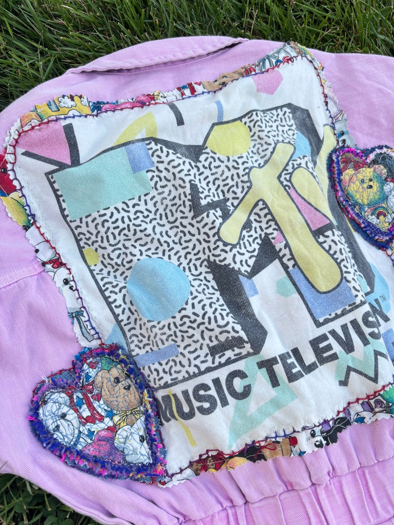 Latchkey Cutie Boiler Suit – Upcycled Orchid Jumpsuit with MTV Graphics | Handmade 90s Sustainable Workwear